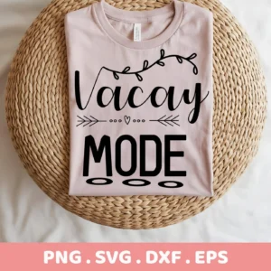 A folded light pink t-shirt with the text "Vacay Mode" in black, featuring decorative elements, rests on a woven surface; this is a Vacay Mode SVG Design available as a digital download bundle including SVG and PNG formats.