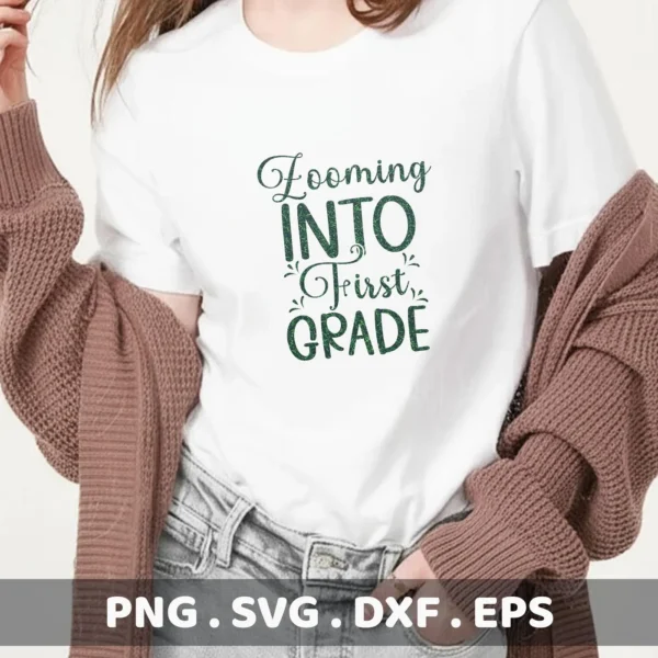 A person wearing a white t-shirt with the text "Zooming INTO First GRADE" in green, showcasing a digital download bundle (SVG, PNG).