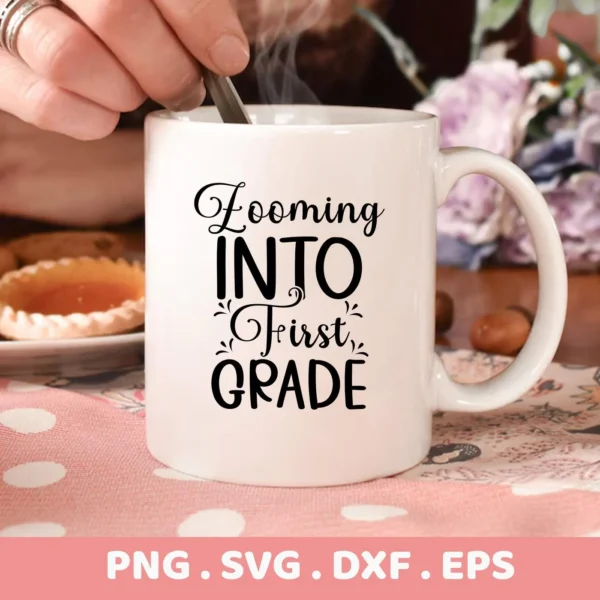 A white mug with the text "Zooming Into First Grade" is shown, representing a digital download bundle (SVG, PNG, DXF, EPS) for back-to-school designs.