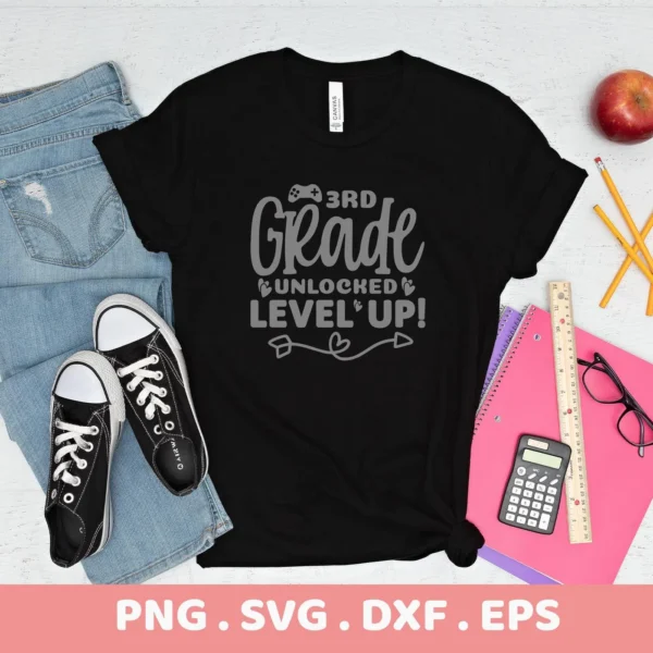 T-shirt mockup with "3rd Grade Unlocked SVG" design. Digital cut file for back-to-school crafts.