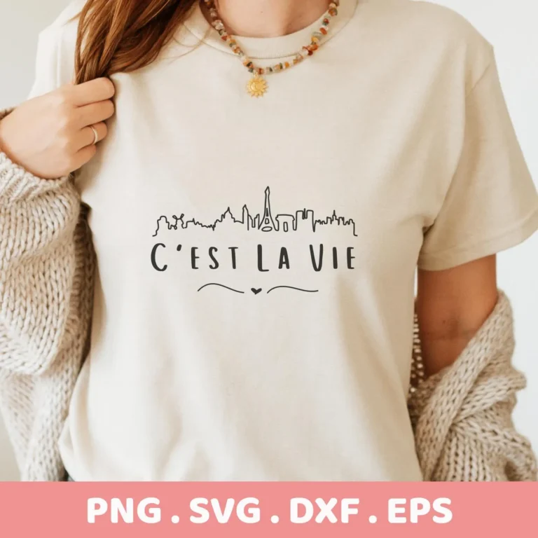 T-shirt mockup with Paris skyline and "C'est la vie" SVG design, a digital file for Cricut and Silhouette projects.