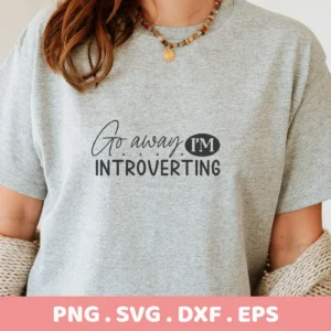 Woman wearing a shirt with "Go Away I'm Introverting" quote SVG design, a digital file for Cricut.