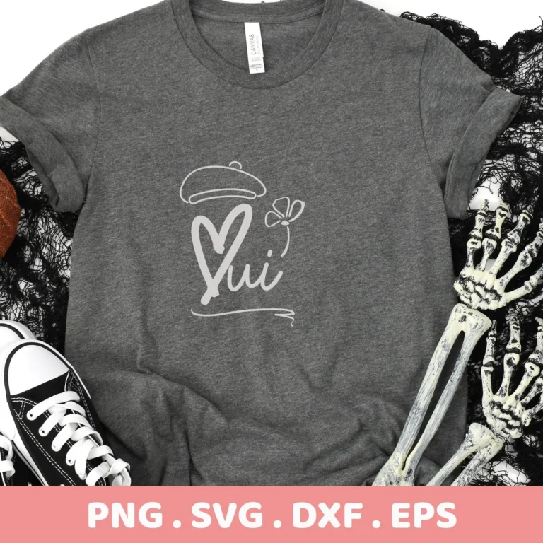 Gray t-shirt mockup featuring Oui Beret Flower SVG design, a digital SVG file for Cricut and Silhouette.