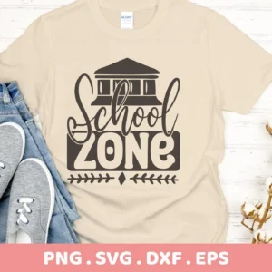 T-shirt mockup with "School Zone" SVG design. Digital cut file for classroom decor.