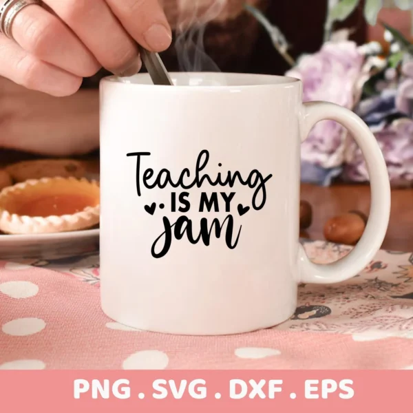 White mug with "Teaching is Jam" SVG design, part of digital download for Cricut and Silhouette crafting.