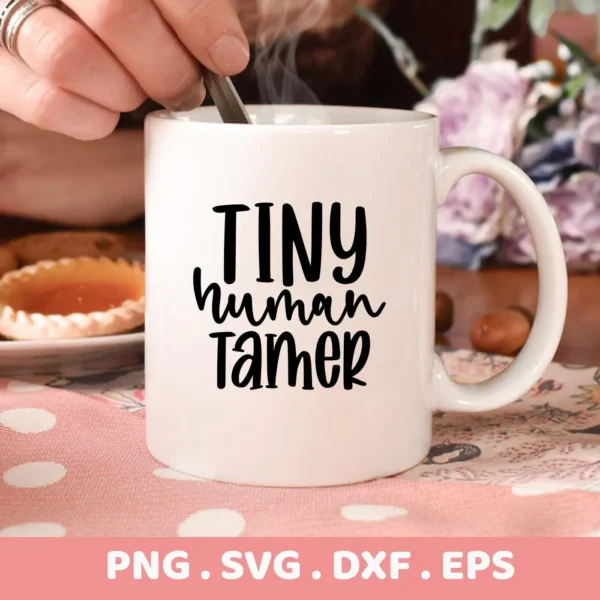 White mug with "Tiny Human Tamer" design. Digital Tiny Human Tamer SVG for Cricut, Silhouette, and other cutting machines.