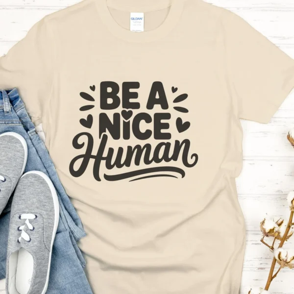Be A Nice Human" design on a t-shirt, a nice human SVG digital file for Cricut and Silhouette projects.