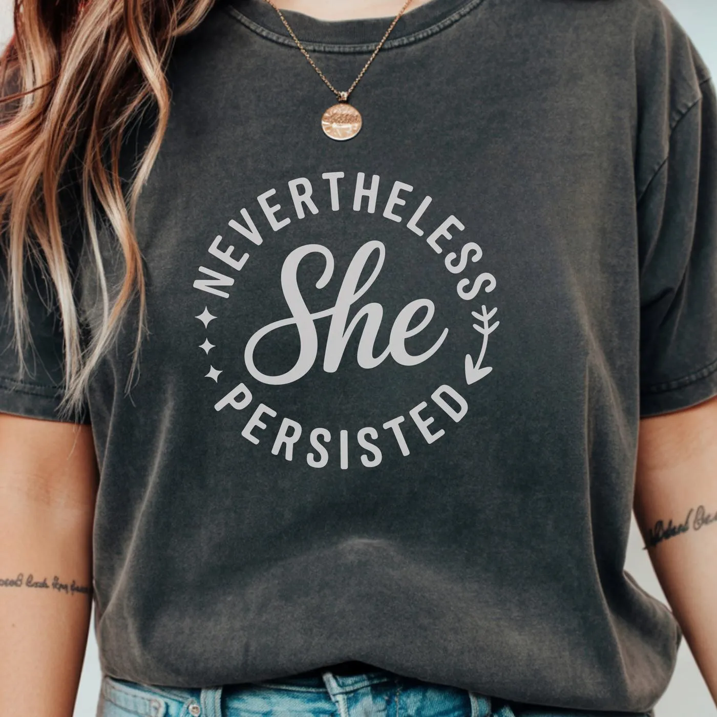 T-shirt mockup with "She Persisted" SVG design, a digital download for Cricut and Silhouette crafting.